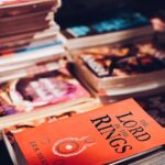 Close-up of a stack of books with The Lord of the Rings prominently displayed in a bookstore.
